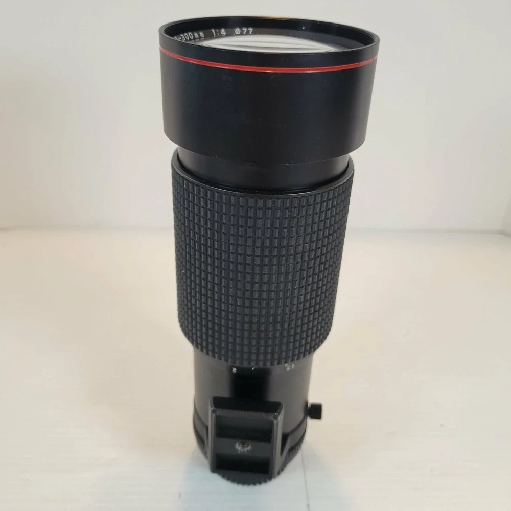 Tokina MF 100-300mm f4 AT-X SD Telephoto Zoom Lens for Minolta MD / MC w Case